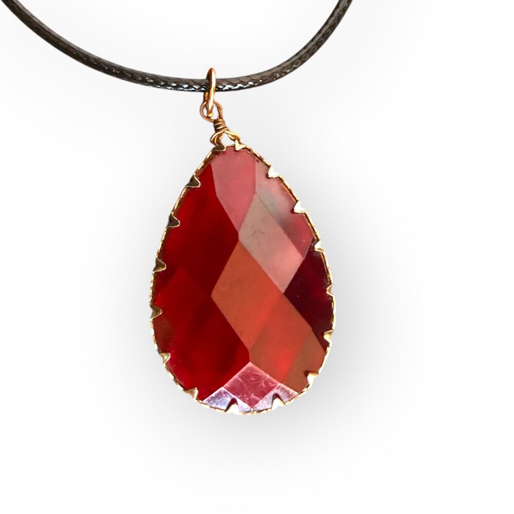 Shimmering red pendant necklace, waxed black cotton cord (plastic cab)